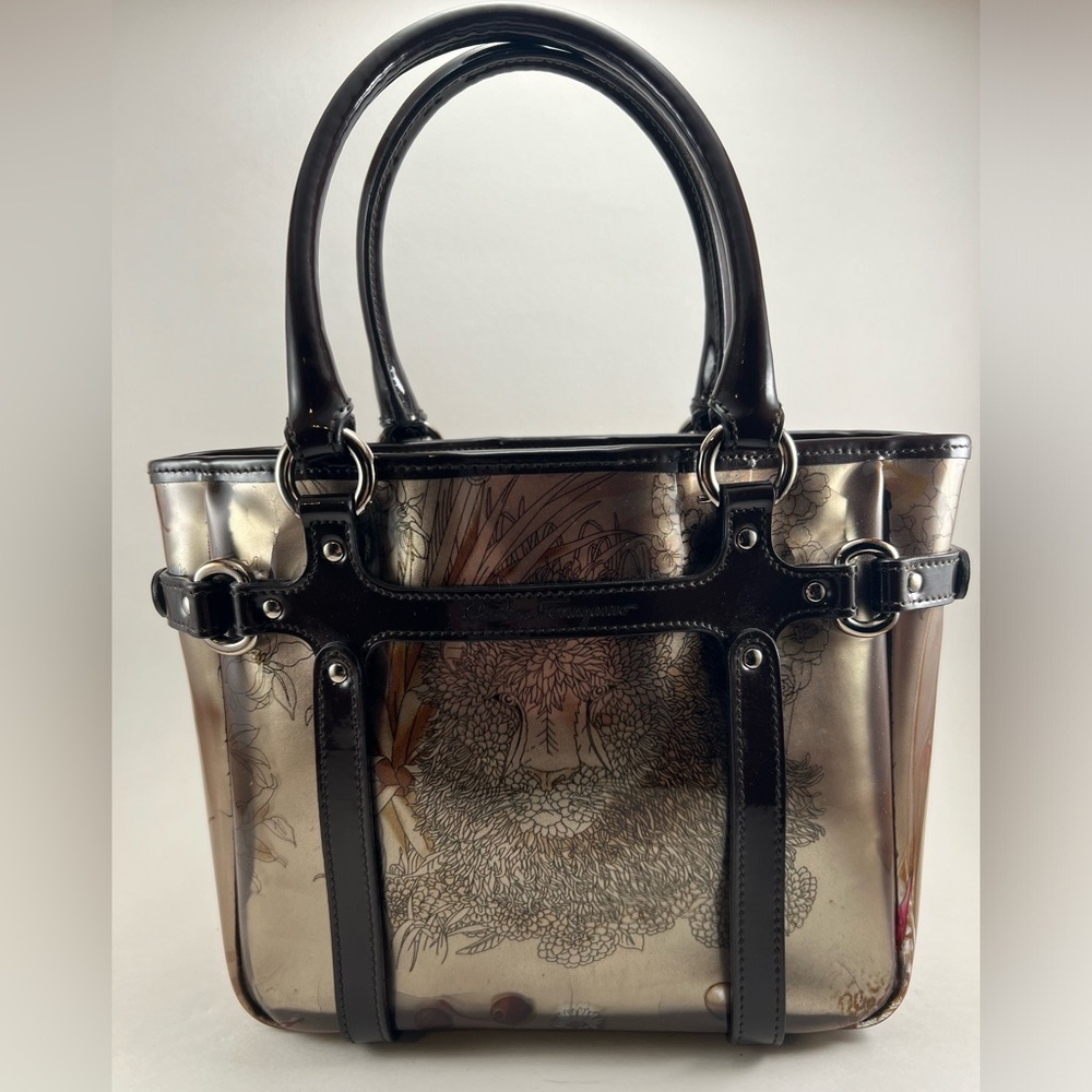 Salvatore Ferragamo small tote handbag with animal (lion) and floral print.